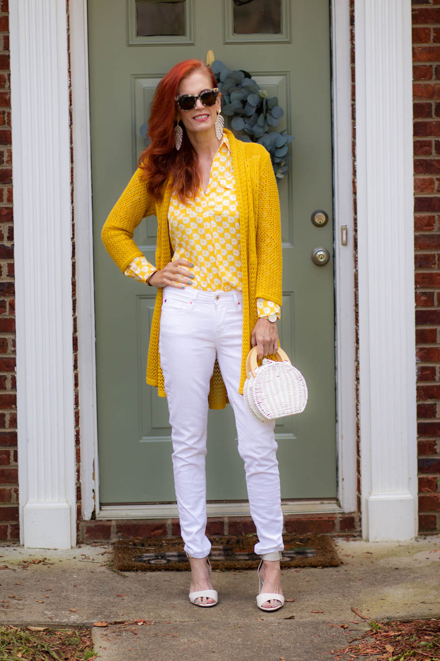 White and yellow blouse and white jeans
